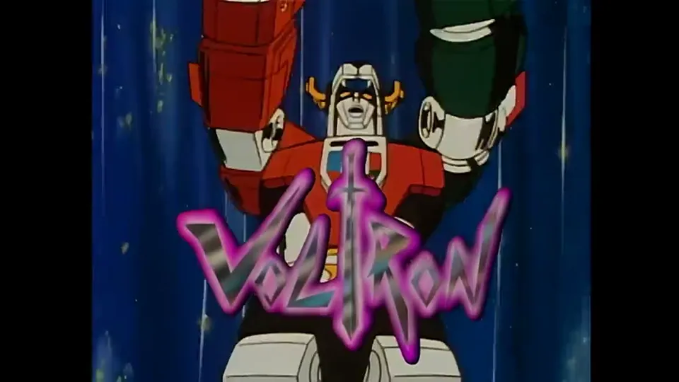 The VOLTRON title card, rainbow wordmark over the assembled robot. It appears twice in the film.