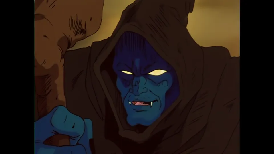 Haggar, hooded, yellow-eyed, with her cat at her shoulder. The film gives her far more to do than a series episode does.