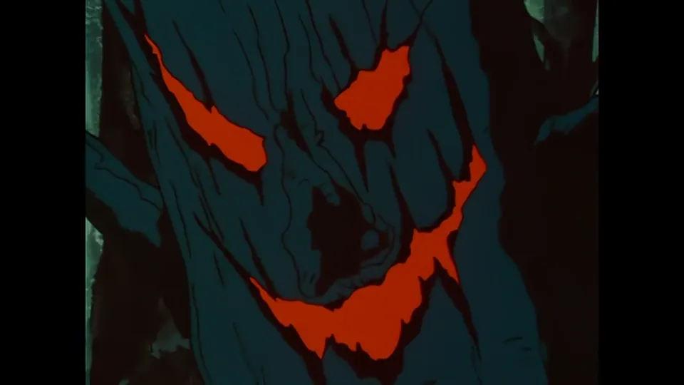 A face made of red light in the dark. The nightmare sequences are the reason this is a special and not an episode.