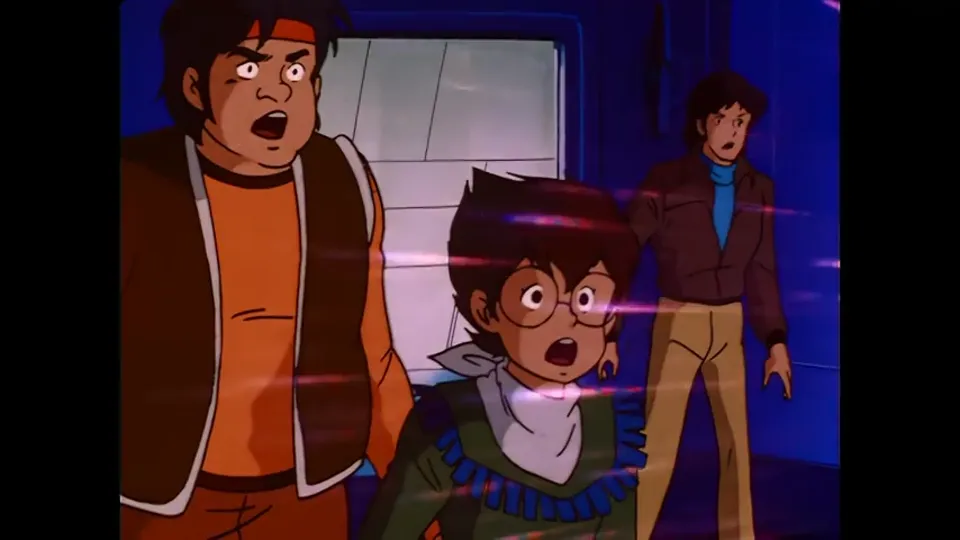 The team reacting to something off frame, three faces stacked in one shot.