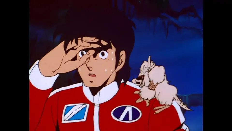 A pilot with a small white creature on his shoulder.