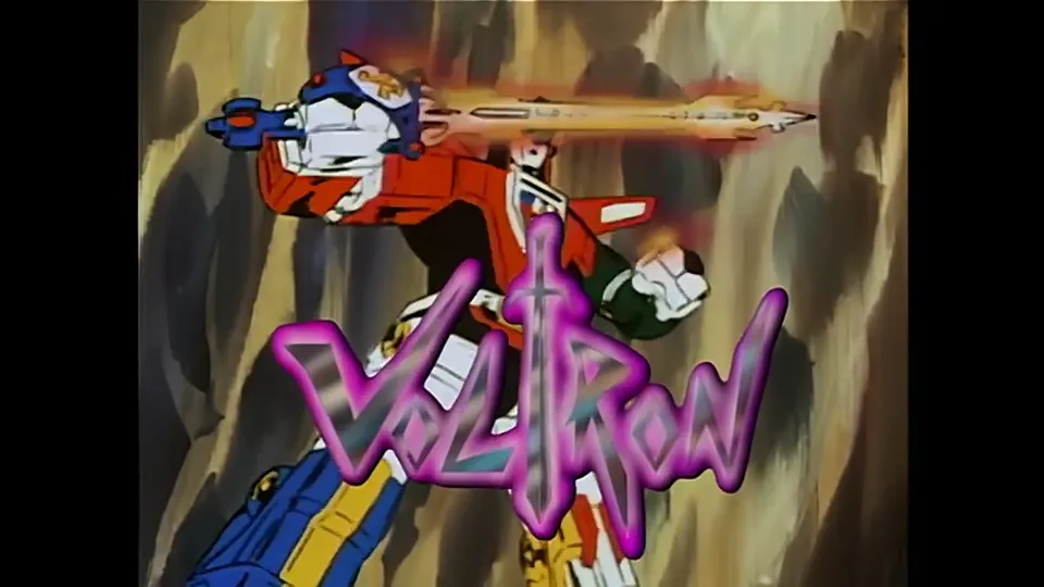 The VOLTRON card again, this time over the robot mid-swing with the Blazing Sword.